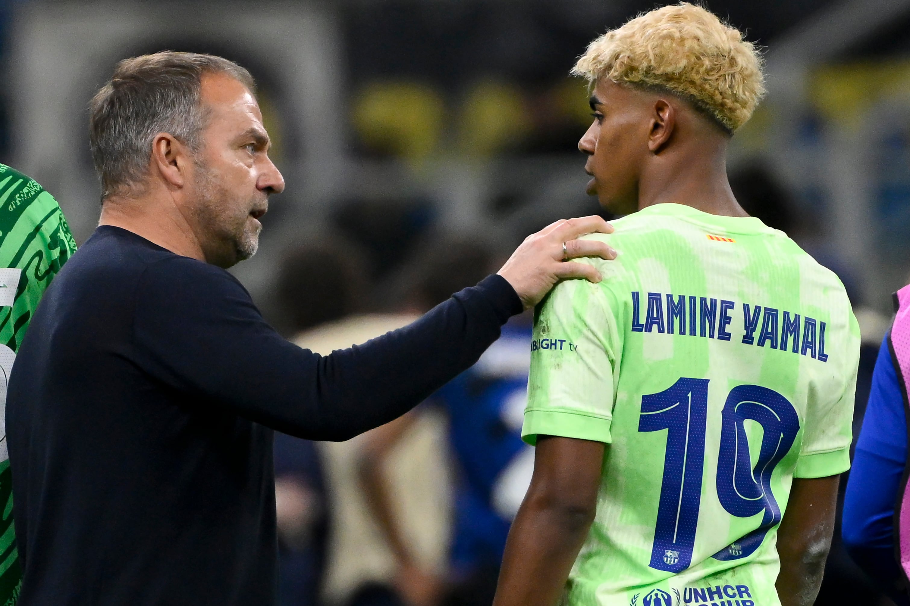 Hansi Flick y Lamine Yamal, en la semifinales de la UEFA Champions League