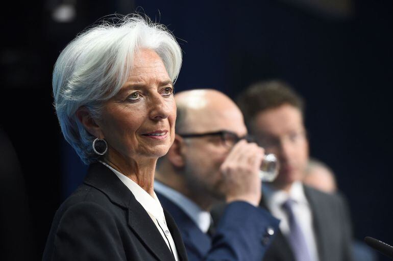 Greek troika members, from left, International Monetary Fund chief Christine Lagarde, European Commissioner for Economic and Financial Affairs, Taxation and Customs Pierre Moscovici  and Eurogroup President and Dutch Finance Minister Jeroen Dijsselbloem g