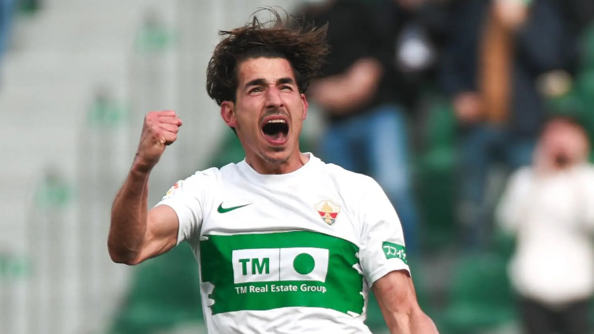 Pere Milla celebra un gol en su etapa como jugador del Elche CF