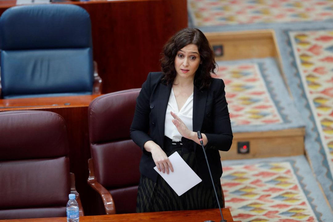 La presidenta de la Comunidad de Madrid, Isabel Díaz Ayuso, durante su intervención en el pleno celebrado este jueves en la Asamblea de Madrid. 