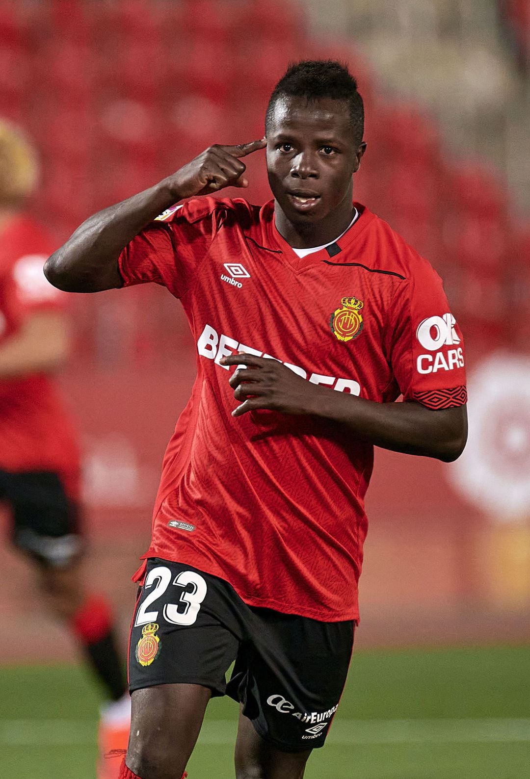 ..MALLORCA, SPAIN - JANUARY 30: Amath Ndiaye of Mallorca celebrates after scoring his team&#039;s first goal during the La Liga Smartbank match between RCD Mallorca and Girona FC at Estadi de Son Moix on January 30, 2021 in Mallorca, Spain. (Photo by Quality S