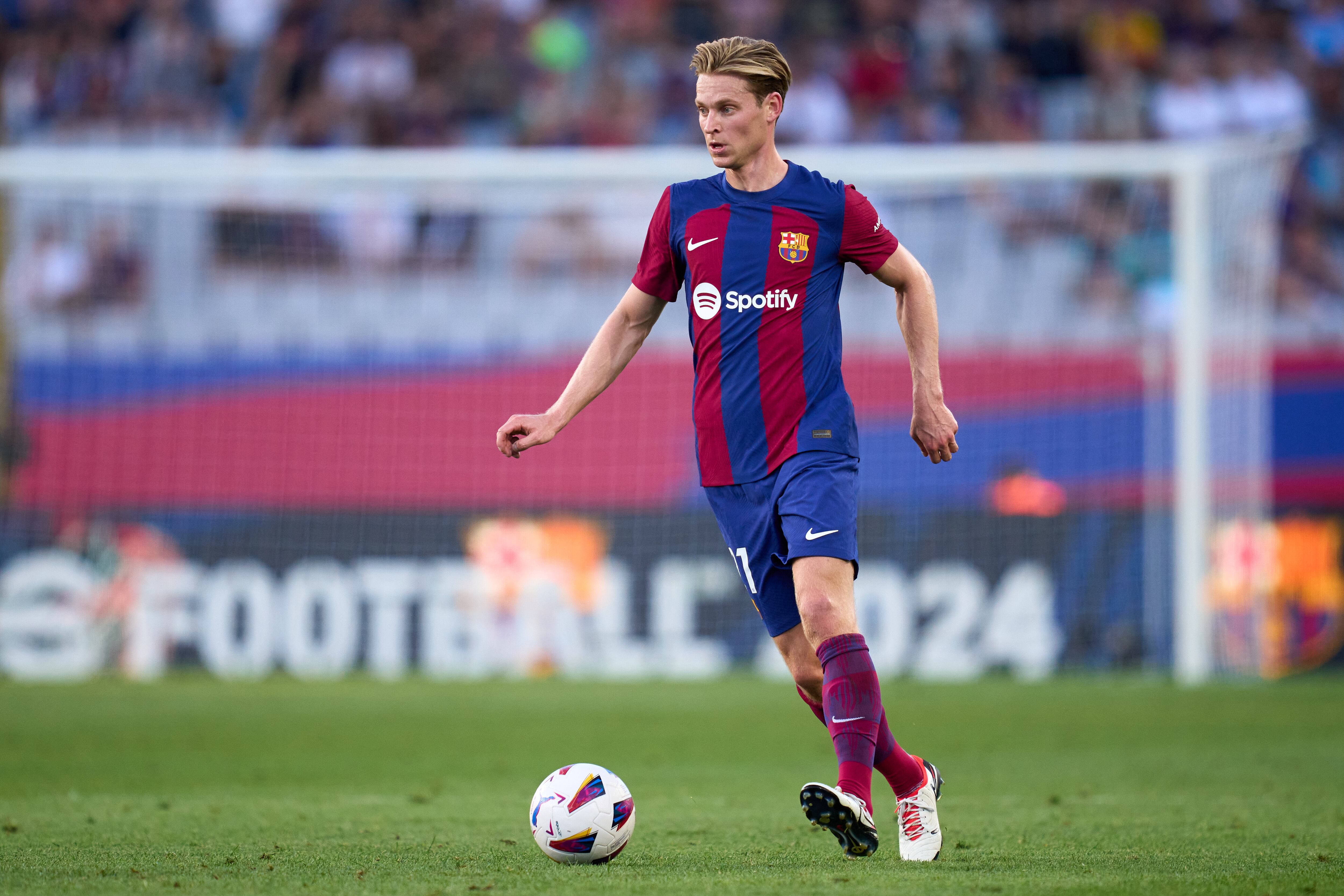 BARCELONA, SPAIN - SEPTEMBER 23: Frenkie De Jong of FC Barcelona runs with the ball during the LaLiga EA Sports match between FC Barcelona and RC Celta at Estadi Olimpic Lluis Companys on September 23, 2023 in Barcelona, Spain. (Photo by Alex Caparros/Getty Images)