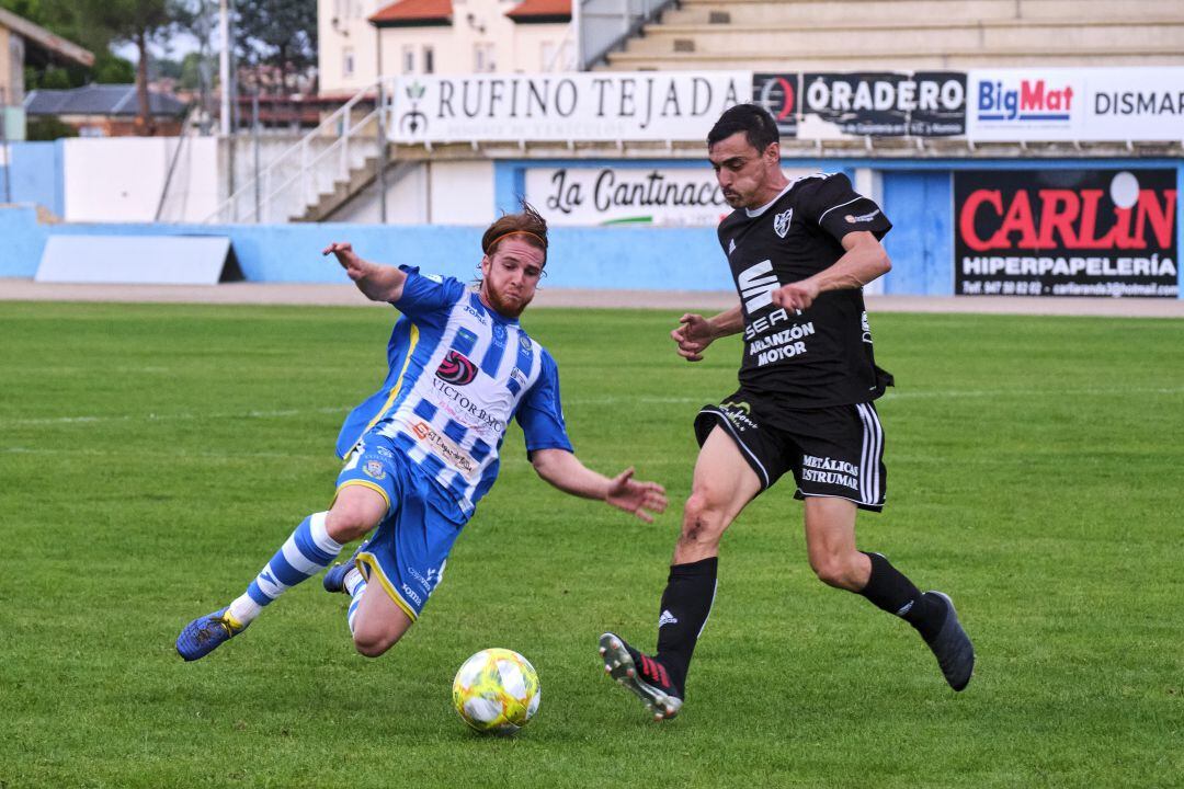 Peli y Bruju (d) durante un partido de esta temporada.