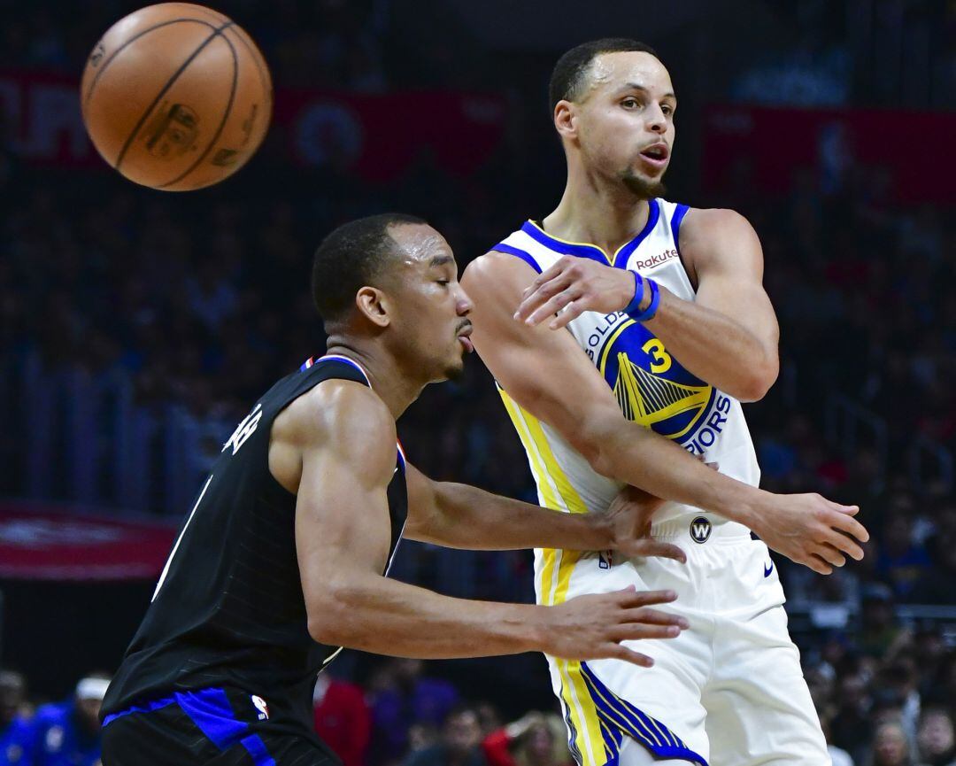 Avery Bradley y Curry en el último partido entre Warriors y Clippers