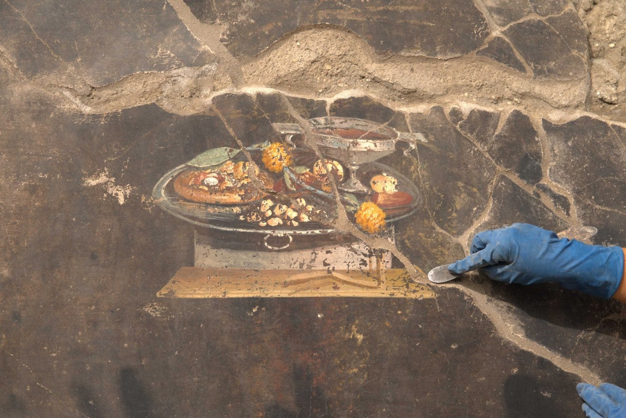 Imagen del fresco con el antecesor de la pizza encontrado en Pompeya (Pompeii Sites).