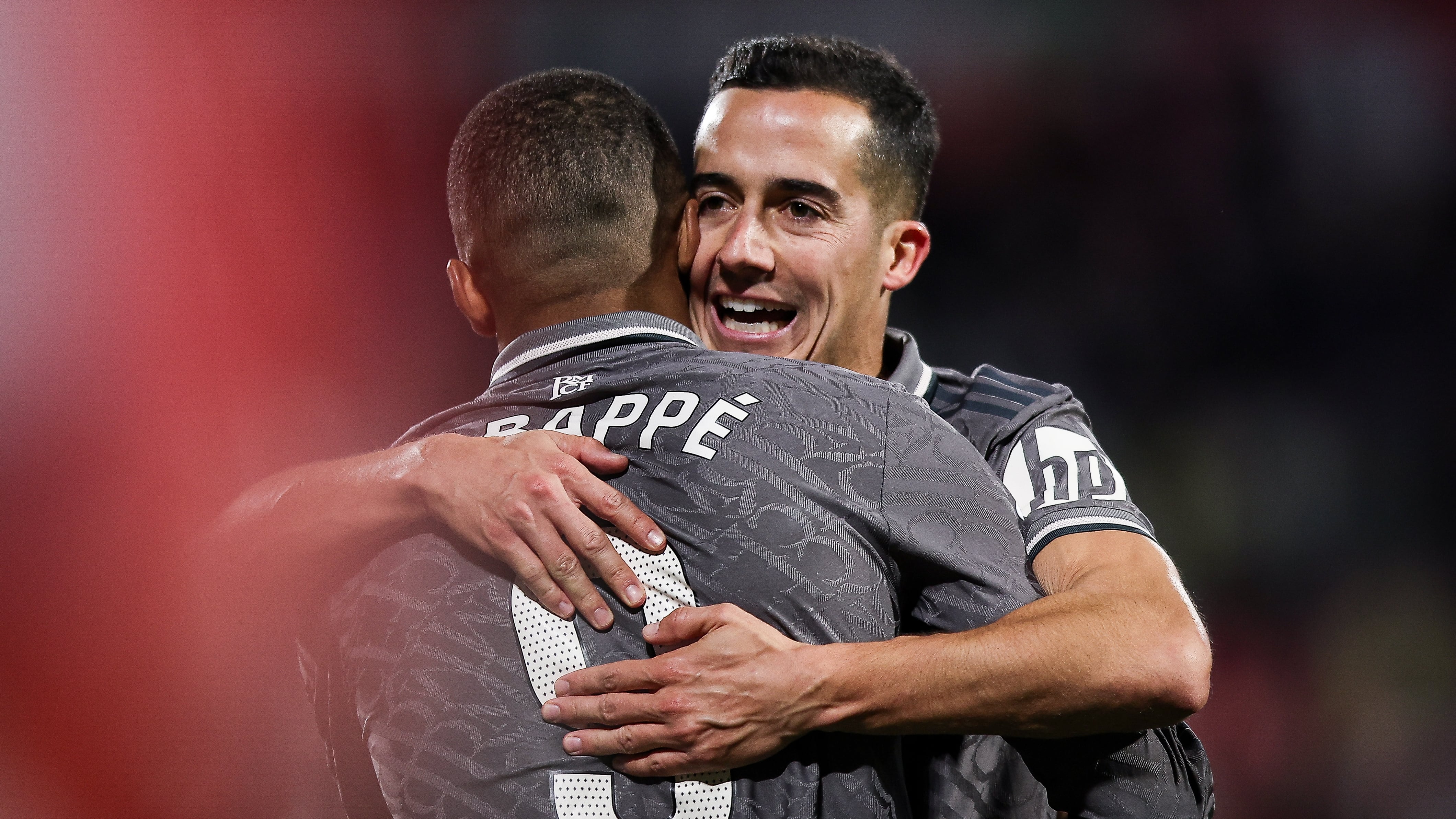 GIRONA, SPAIN - DECEMBER 07: Kylian Mbappe of Real Madrid celebrates with Lucas Vazquez of Real Madrid after scoring the team's third goal during the LaLiga match between Girona FC and Real Madrid CF at Montilivi Stadium on December 07, 2024 in Girona, Spain. (Photo by Eric Alonso/Getty Images)