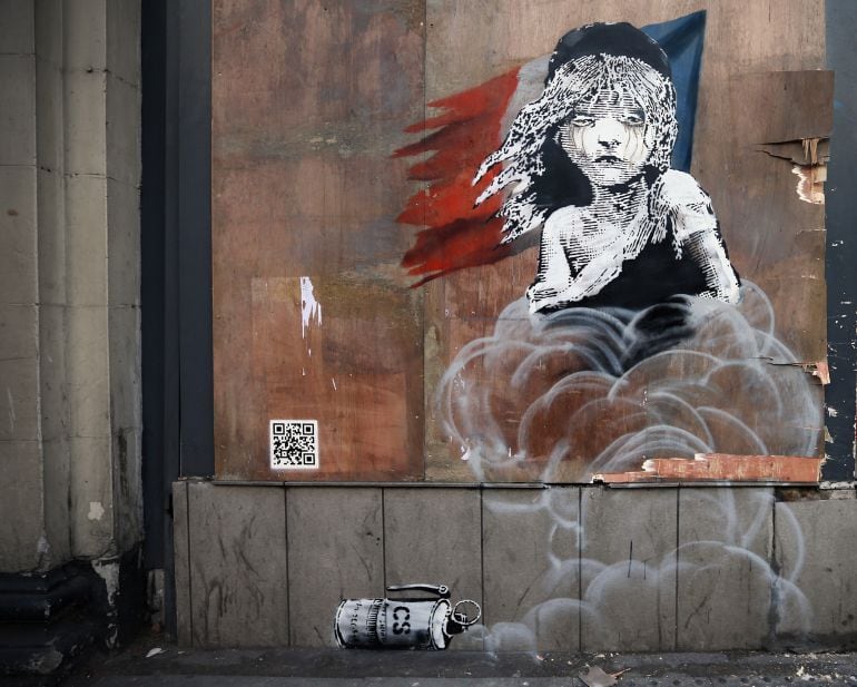 Un mural del artista Banksy en una de las calles londinenses. 