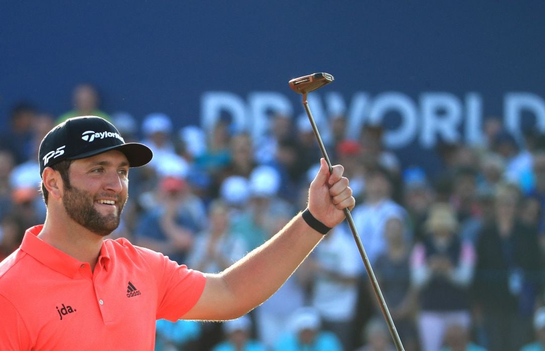 DUBAI, UNITED ARAB EMIRATES - NOVEMBER 24: Jon Rahm of Spain celebrates on the eighteenth green after winning the DP World Tour Championship and Race to Dubai during Day Four of the DP World Tour Championship Dubai at Jumerirah Golf Estates on November 24, 2019 in Dubai, United Arab Emirates.  