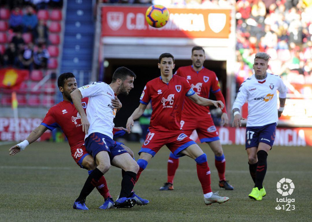 Gus Ledes, Nacho y Atienza, durante el reciente Numancia-Osasuna.