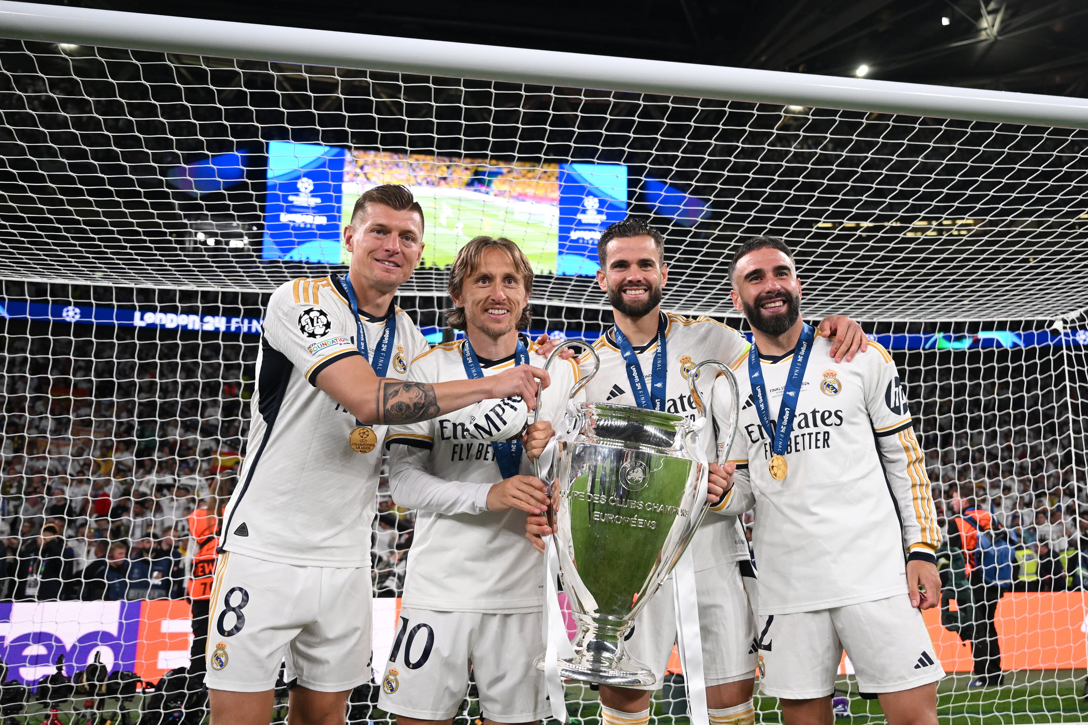 Toni Kroos, Luka Modric, Nacho Fernández y Daniel Carvajal posan con el trofeo de la Champions League 2024. (Photo by Michael Regan - UEFA/UEFA via Getty Images)