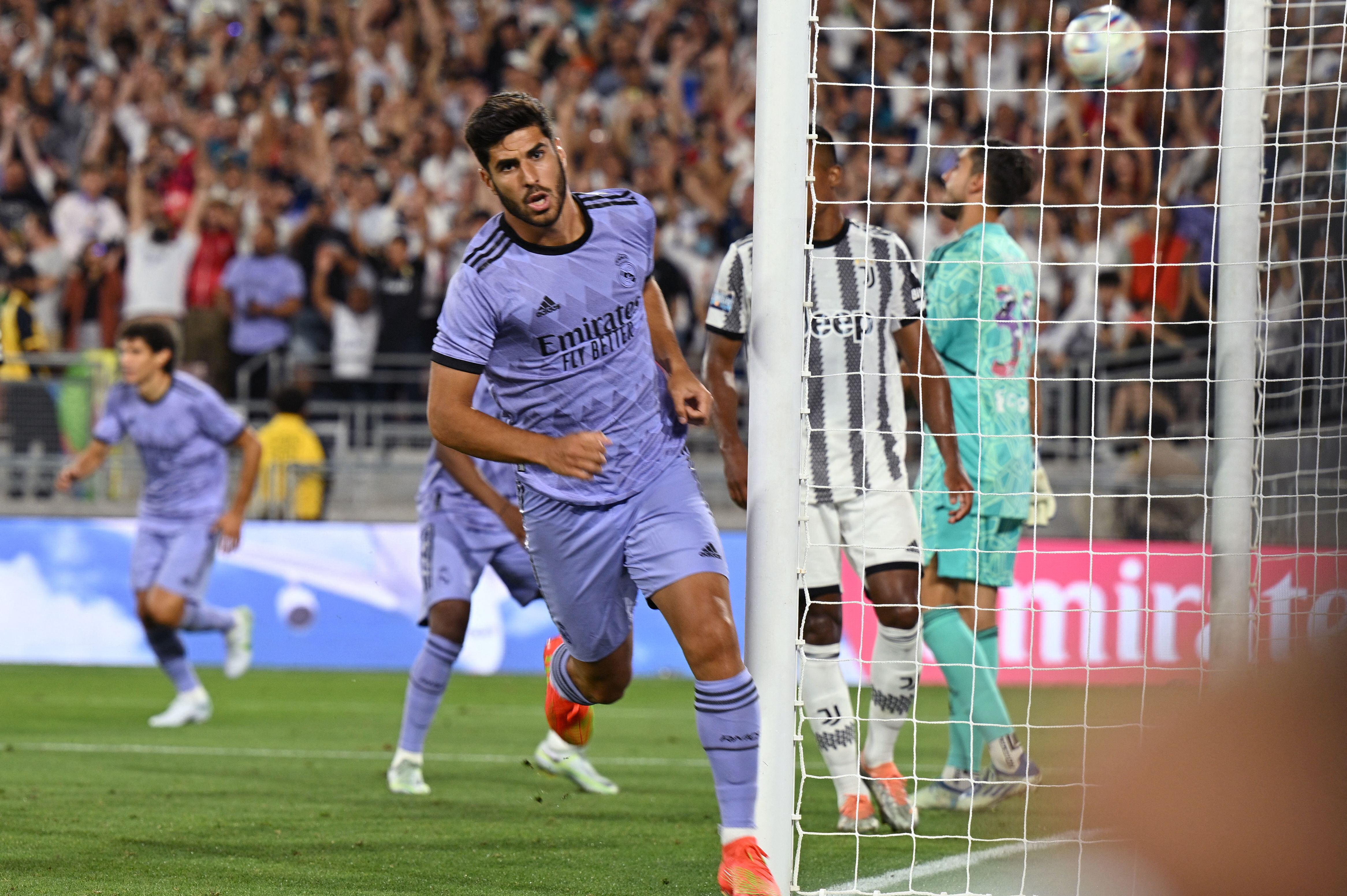 Marco Asensio celebra el segundo gol del partido