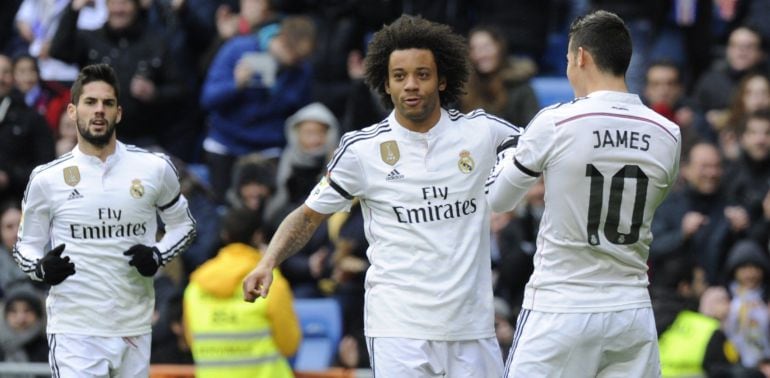 El brasileño celebra un tanto del Real Madrid con James Rodríguez.