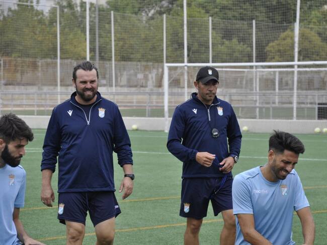 JUan Carlos Gómez junto a Juan Pedro durante un entrenamiento