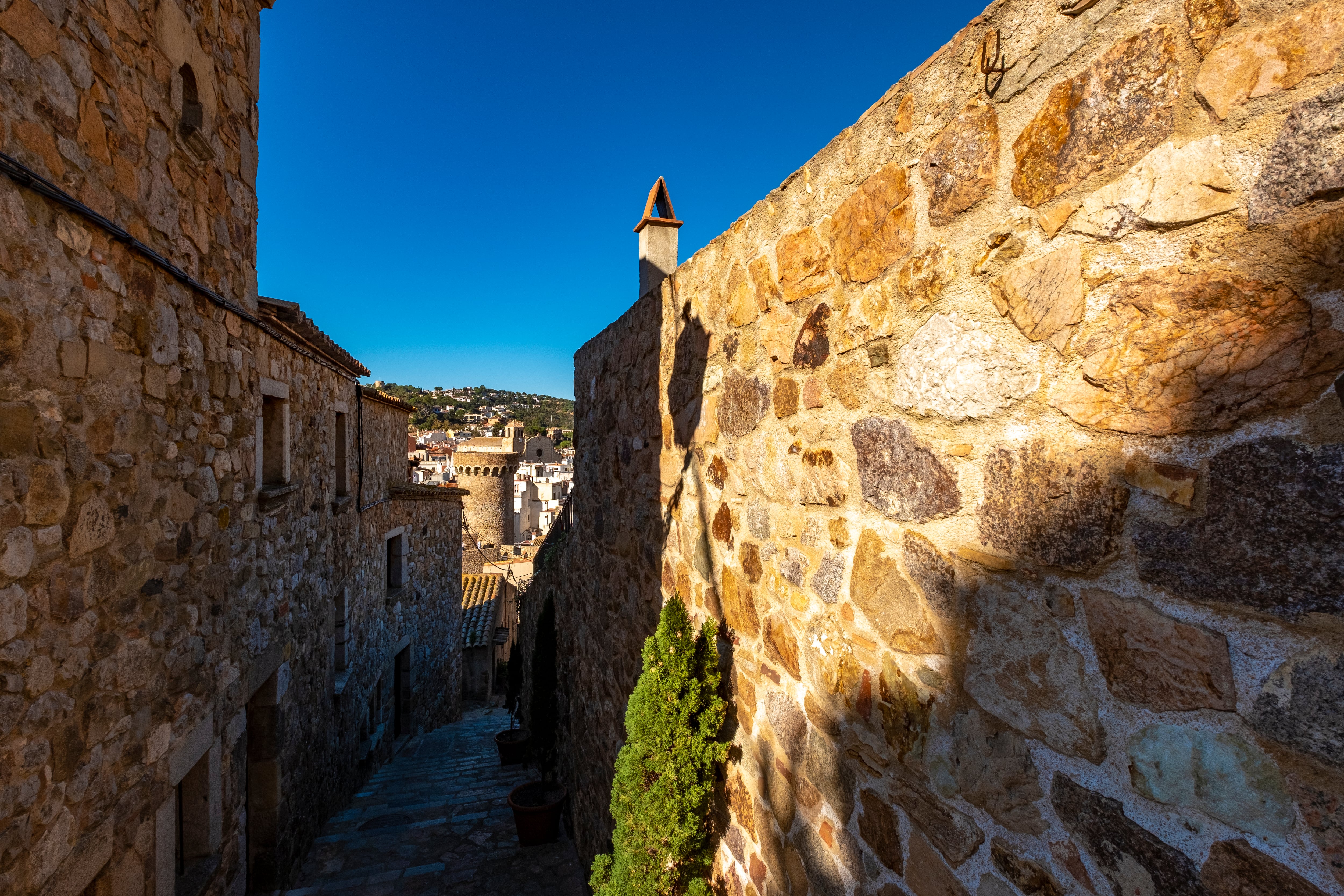 Medieval streets located in the old town of Tossa de Mar, in the castle area. This city is located on the Mediterranean coast, on the Costa Brava, Spain