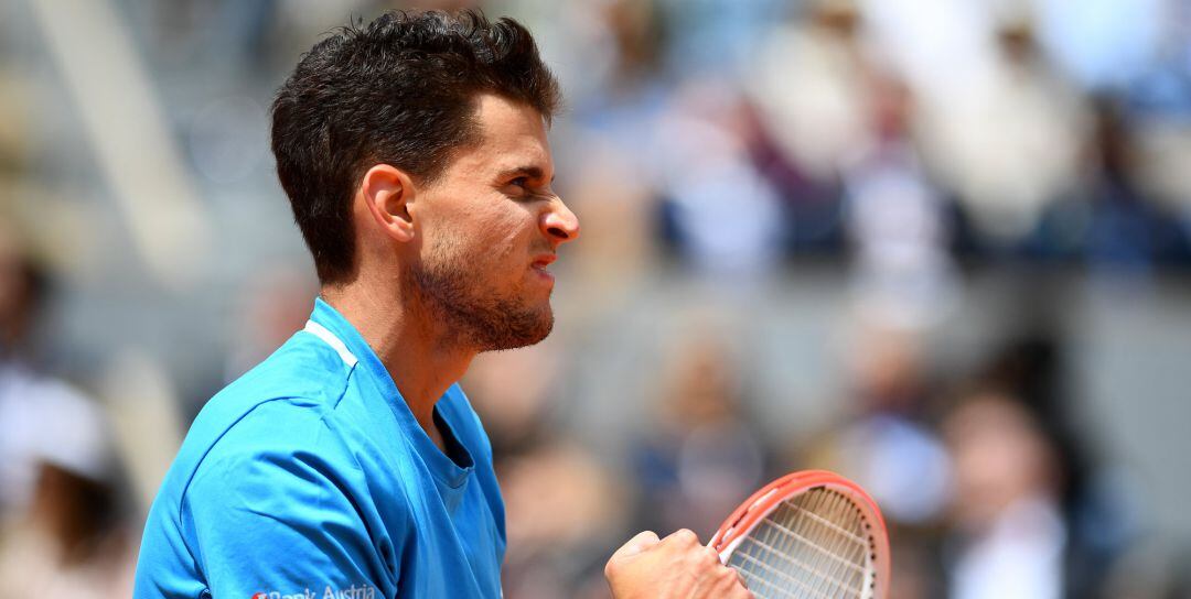 Dominic Thiem celebra un punto ante Djokovic