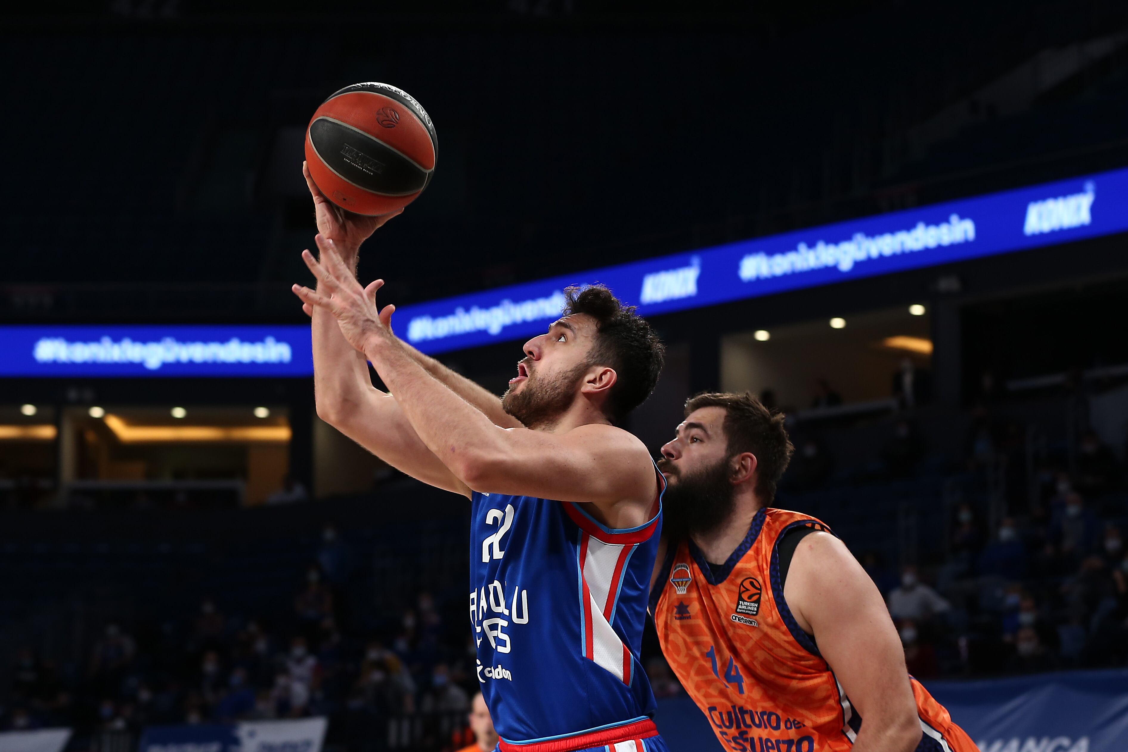 ISTANBUL, TURKEY - MARCH 02: Vasilije Micic, #22 of Anadolu Efes Istanbul  in action with Bojan Dubljevic, #14 of Valencia Basket during the 2020/2021 Turkish Airlines EuroLeague Regular Season Round 27 match between Anadolu Efes Istanbul and Valencia Basket  at Sinan Erdem Dome on March 02, 2021 in Istanbul, Turkey. (Photo by Tolga Adanali/Euroleague Basketball via Getty Images)