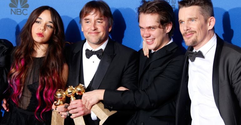 BEVERLY HILLS, CA - JANUARY 11:  (L-R) Actress Lorelei Linklater, director Richard Linklater, actors Ellar Coltrane and actor Ethan Hawke, winners of Best Motion Picture - Drama for &#039;Boyhood,&#039; pose in the press room during the 72nd Annual Golden Globe Awa