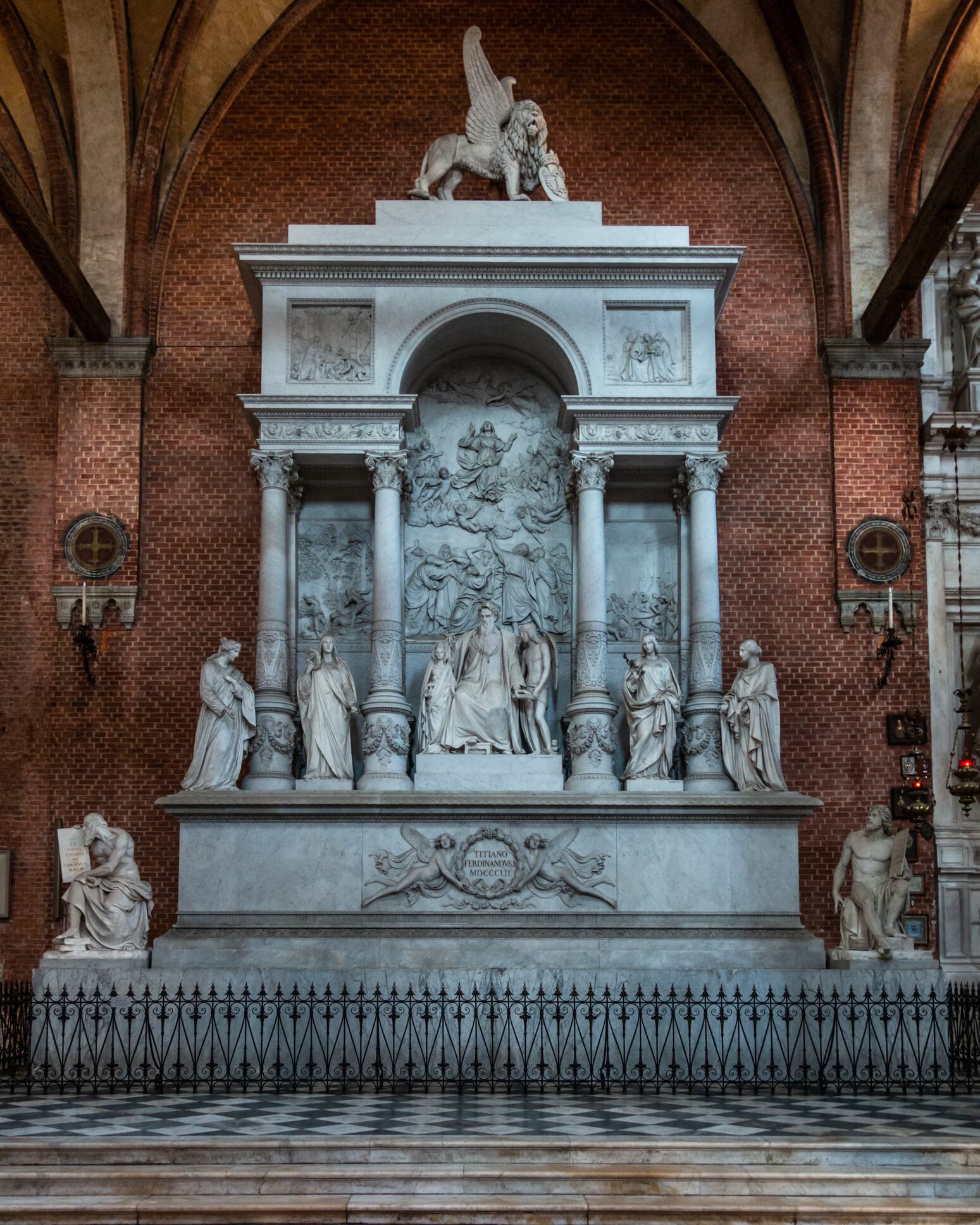 The monument of Titian (tomb of Tiziano Vecellio) inside the Basilica dei Frari, Venice, Italy