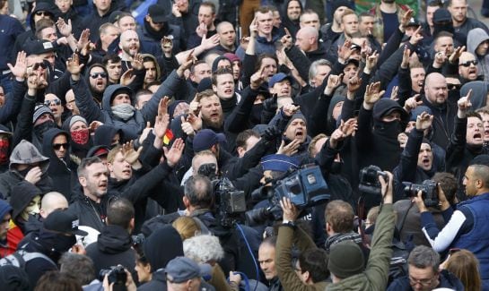 Right-wing demonstrators protest against terrorism in front of the old stock exchange in Brussels, Belgium. March 27. 2016. REUTERS/Yves Herman