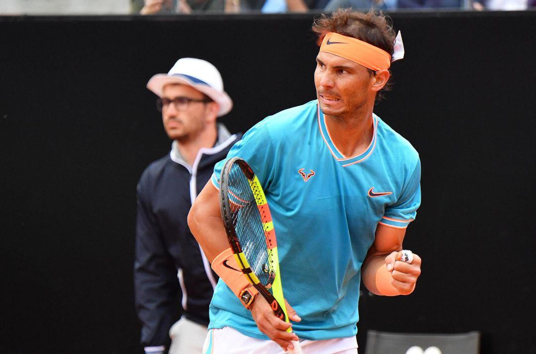 Nadal celebra un punto ante Djokovic.