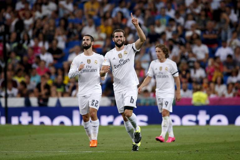 Real Madrid&#039;s Nacho Fernandez (C) celebrates his goal during their Santiago Bernabeu Trophy soccer match against Galatasaray at Santiago Bernabeu stadium in Madrid, Spain, August 18, 2015. REUTERS/Juan Medina