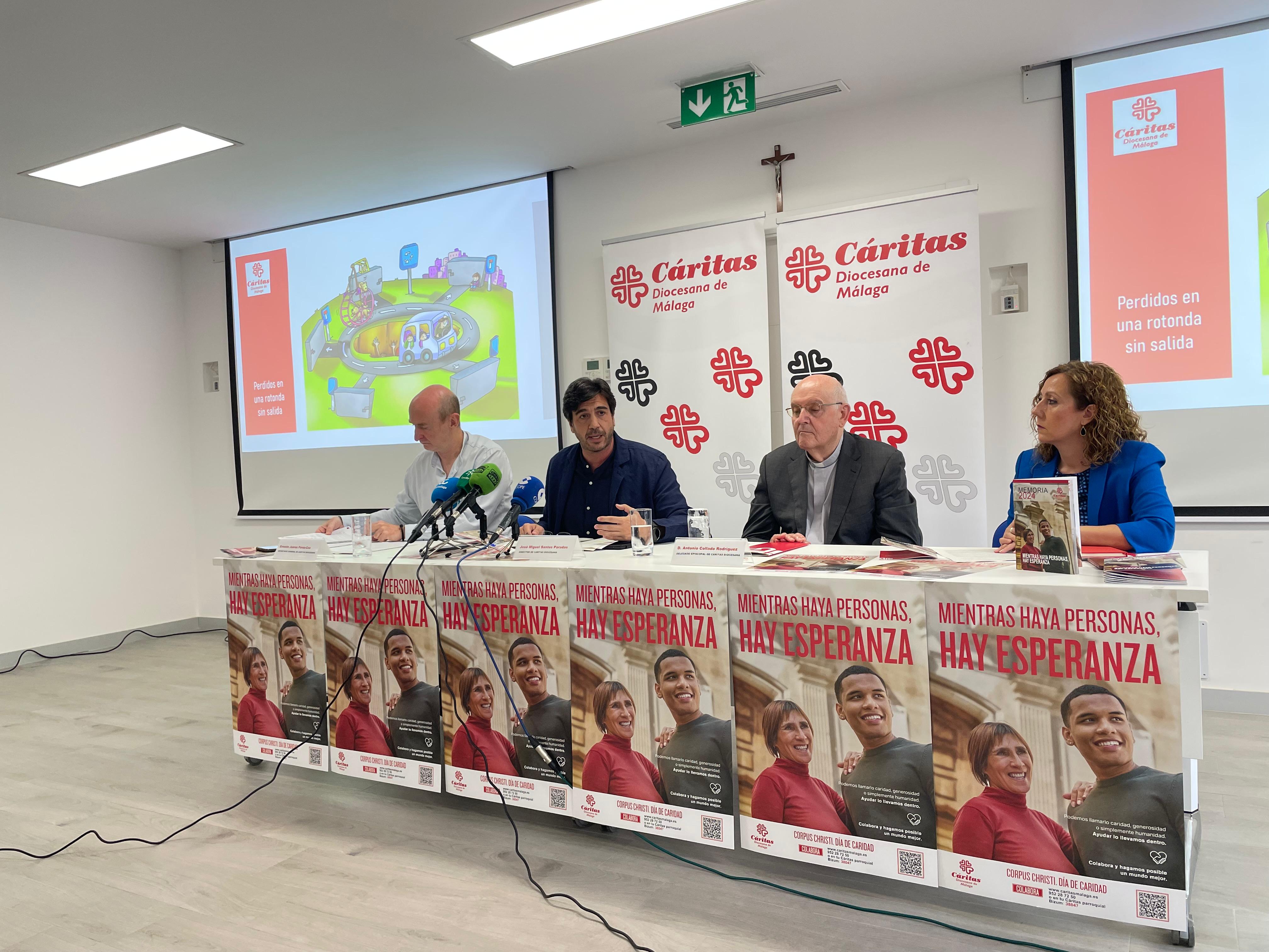Rueda de prensa de los responsables de Cáritas Málaga para presentar la memoria anual