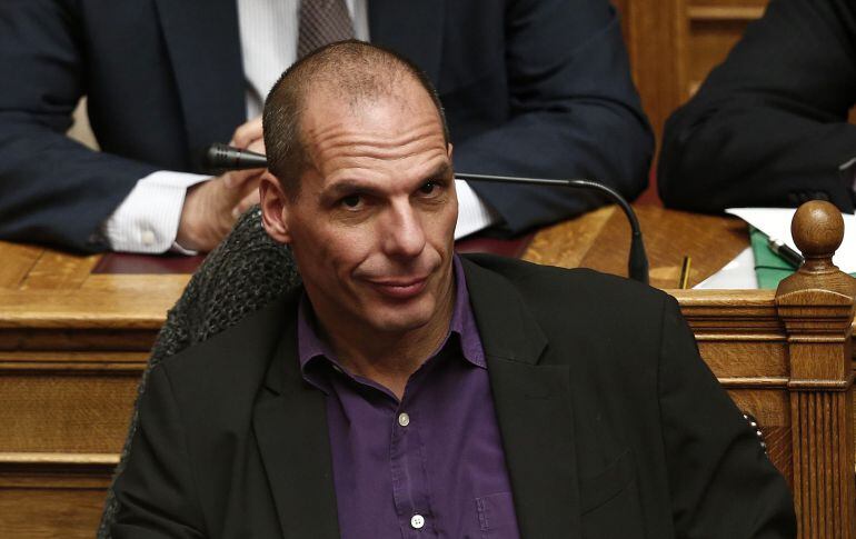 Greek Finance Minister Yanis Varoufakis looks on before the first major speech of Greek Prime Minister Alexis Tsipras in parliament in Athens February 8, 2015. Greek Prime Minister Alexis Tsipras on Sunday dismissed his country&#039;s European Union and Intern