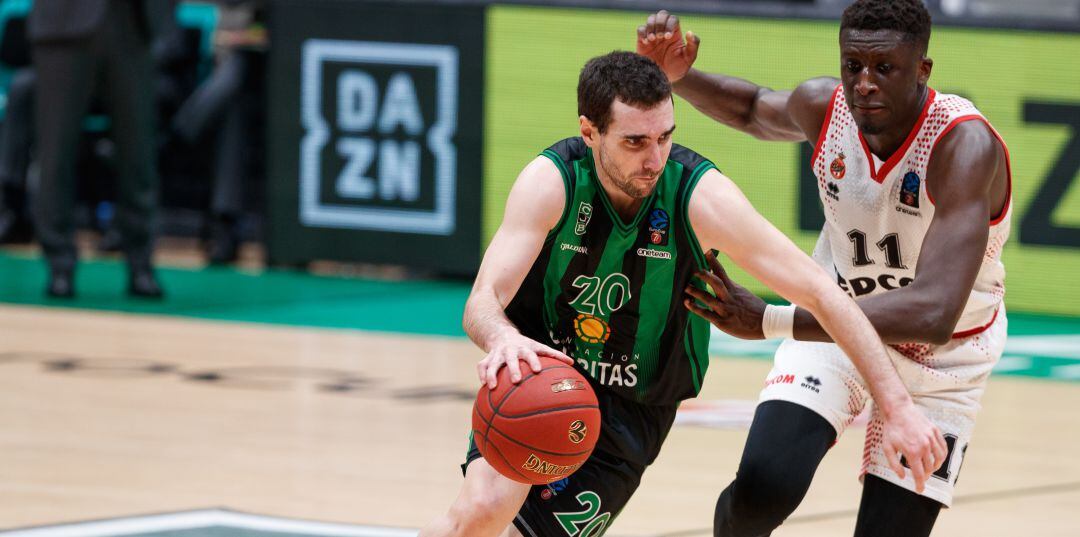 Ferran Bassas of Club Joventut Badalona in action with Abdoulaye Ndoye of AS Monaco during the Eurocup 7 Days Top 16 Round 3 match between Club Joventut Badalona and AS Monaco at Pabellon Olimpico de Badalona in Barcelona, Spain