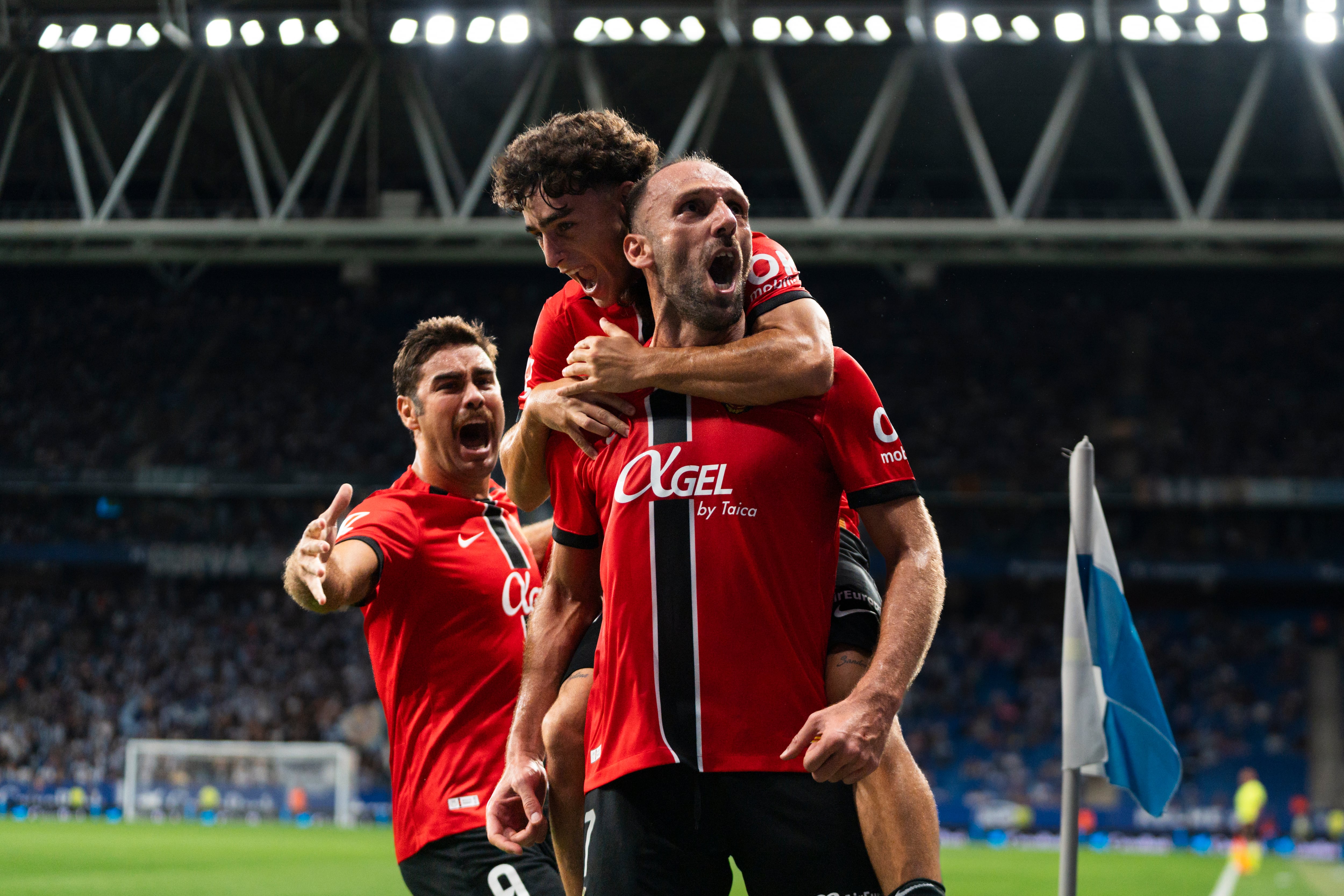 Vedat Muriqi, Jan Virgili, and Abdon Prats of RCD Mallorca celebrate a goal during the LaLiga EA Sports match between RCD Espanyol and RCD Mallorca at RCDE Stadium in Barcelona, Spain, on September 15, 2025. (Photo by Ruben De La Rosa/NurPhoto via Getty Images)