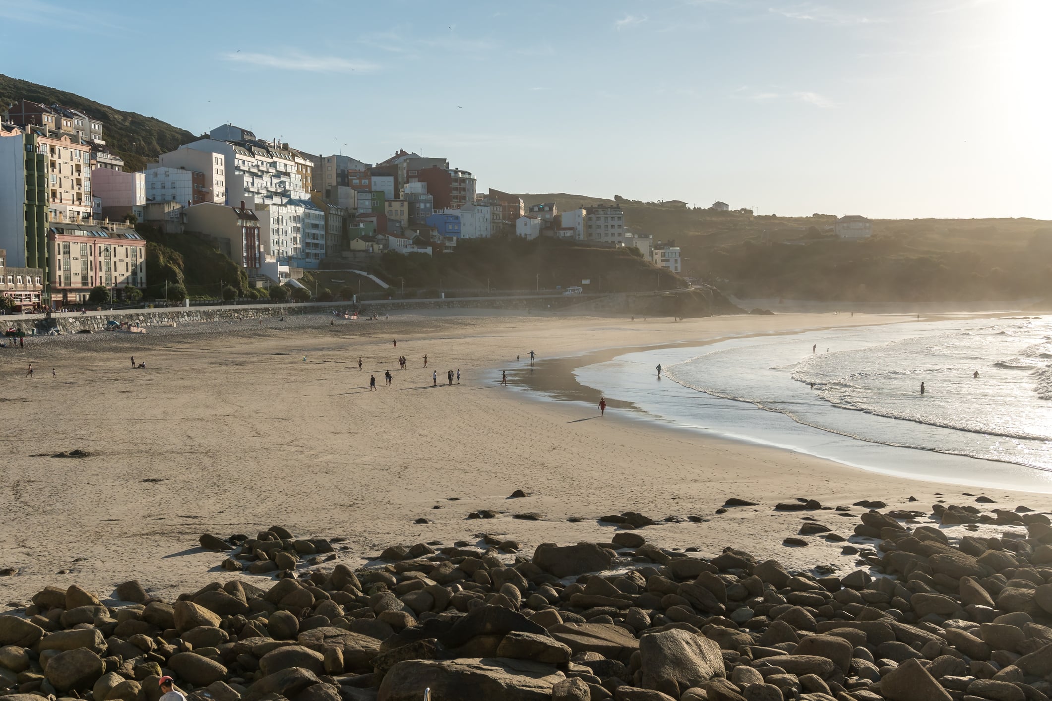 People enjoying the beach of Malpica, A Coruna, Galicia, Spain