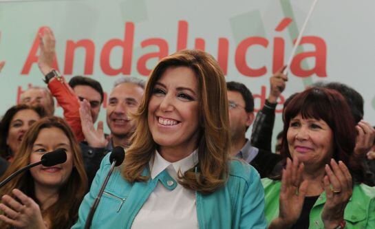 President of regional government of Andalusia and Spanish Socialist Party (PSOE) candidate Susana Diaz (C) celebrates winning after the closing of polls in Sevilla on March 22, 2015. According to partial results after counting 89.5% of the ballots, the So