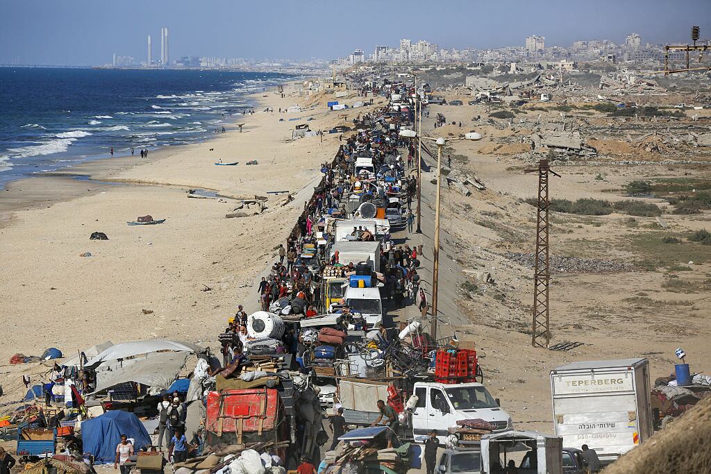 GAZA - SEPTEMBER 16: Palestinians flee toward southern Gaza via al-Rashid Street, carrying their belongings on foot or by vehicle after intensified Israeli attacks and evacuation orders in the northern Gaza Strip on September 16, 2025. (Photo by Stringer/Anadolu via Getty Images)