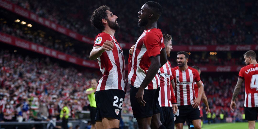 Raul Garcia of Athletic Bilbao celebrates with Inaki Williams after scoring their team&#039;s first goal during the LaLiga Santander match between Athletic Club and Deportivo Alaves at San Mames Stadium on October 01, 2021 in Bilbao