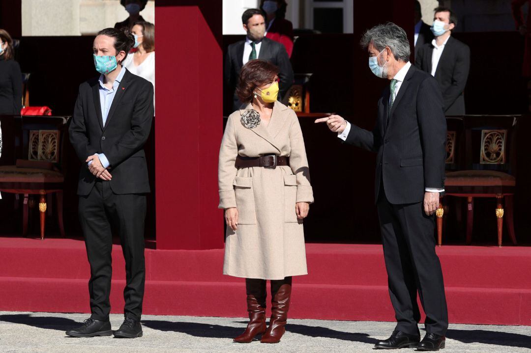  Los vicepresidentes del Gobierno, Pablo Iglesias (i) y Carmen Calvo (c), junto al presidente del Consejo General del Poder Judicial, Carlos Lesmes, 