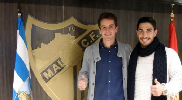 Rafa de Vicente y el ex grana Víctor Ruiz tras renovar con el Málaga en 2014 (foto malagacf.com)