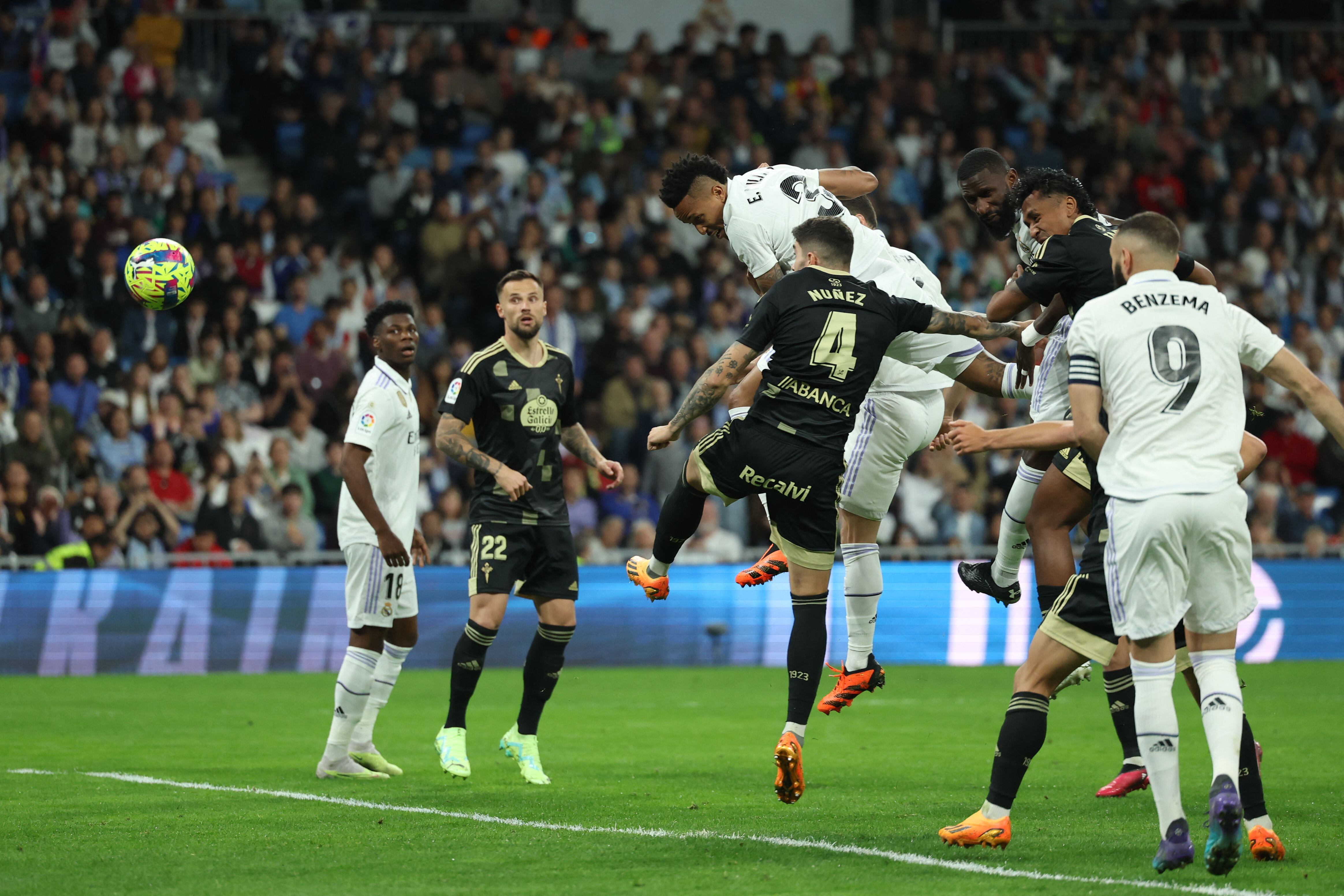 Real Madrid&#039;s Brazilian defender Eder Militao (up) heads and scores his team&#039;s second goal during the Spanish league football match between Real Madrid CF and RC Celta de Vigo at the Santiago Bernabeu stadium in Madrid on April 22, 2023. (Photo by Thomas COEX / AFP) (Photo by THOMAS COEX/AFP via Getty Images)