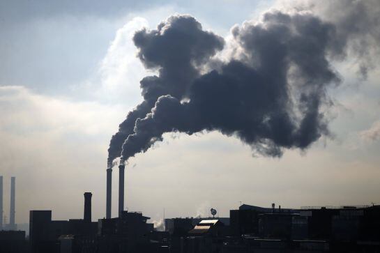 Water vapour billows from smokestacks at the incineration plant of Ivry-sur-Seine, near Paris, France, November 23, 2015. The capital will host the World Climate Change Conference 2015 (COP21) from November 30 to December 11. REUTERS/Charles Platiau