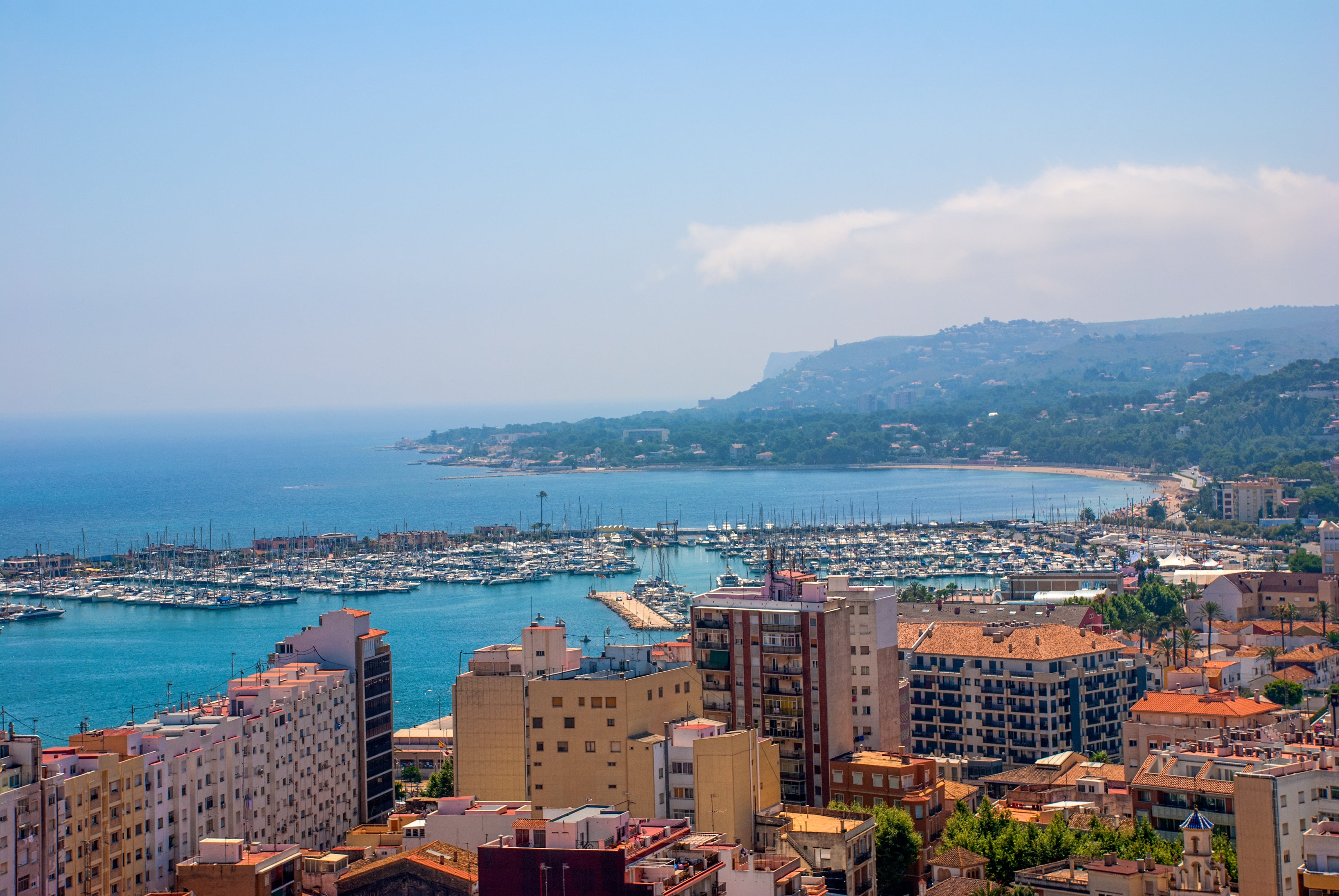 Denia town & marina as seen from Denia Castle on a hazy day in summertime, Denia, Valencia, Alicante, Spain, Europe, July 3 2008.