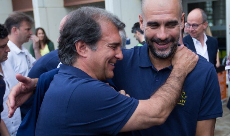 Joan Laporta y Pep Guardiola, en un acto de la Fundación Johan Cruyff.