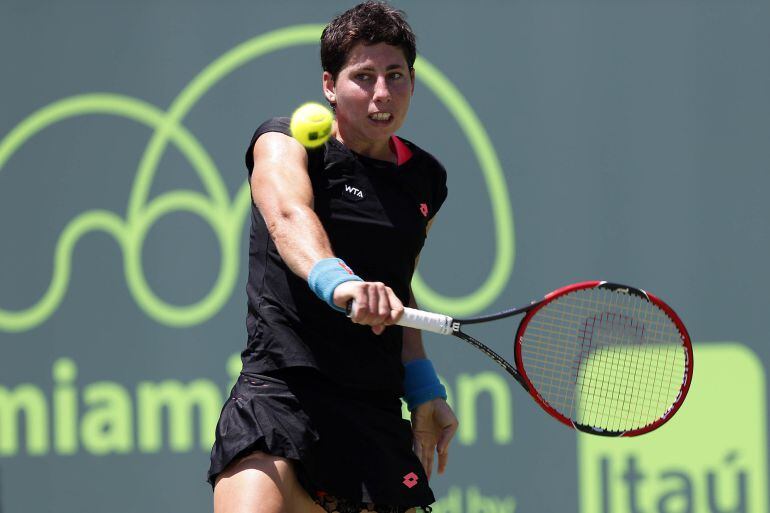 Apr 4, 2015; Key Biscayne, FL, USA; Carla Suarez Navarro hits a backhand against Serena Williams (not pictured) in the women&#039;s singles final on day thirteen of the Miami Open at Crandon Park Tennis Center. Williams won 6-2, 6-0. Mandatory Credit: Geoff Burke-USA TODAY Sports