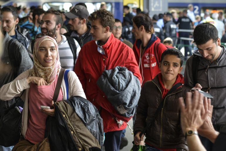 Refugiados, a su llegada en tren a Múnich