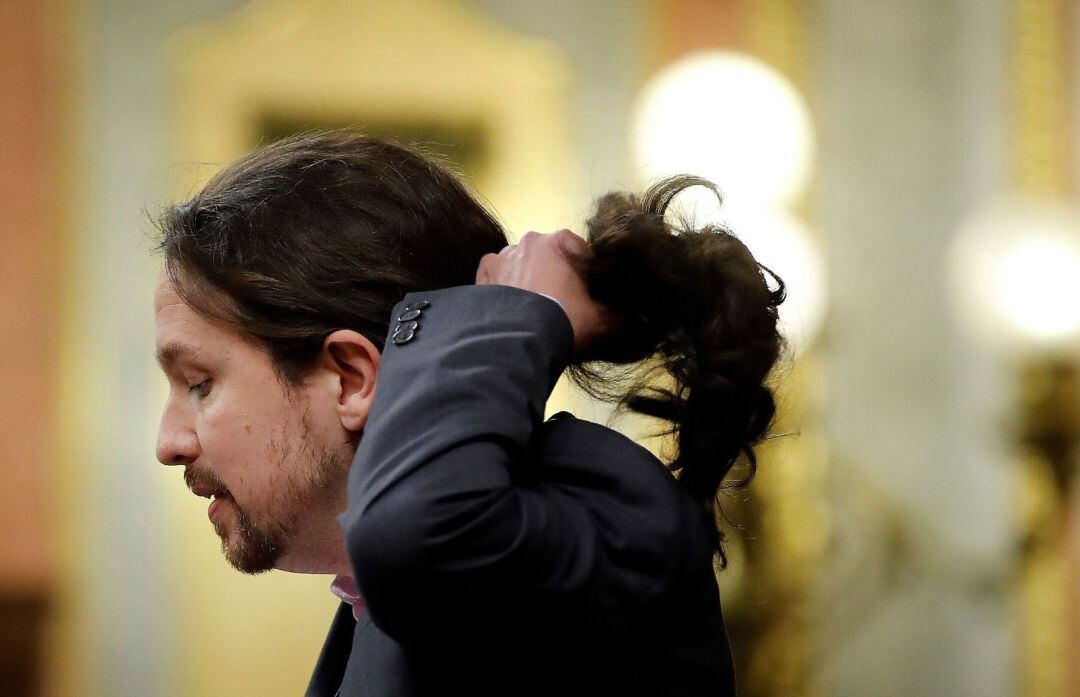 El líder de Unidas Podemos, Pablo Iglesias, durante su intervención ante el pleno del Congreso de los Diputados en la primera jornada de la sesión de investidura de Pedro Sánchez como presidente del Gobierno.