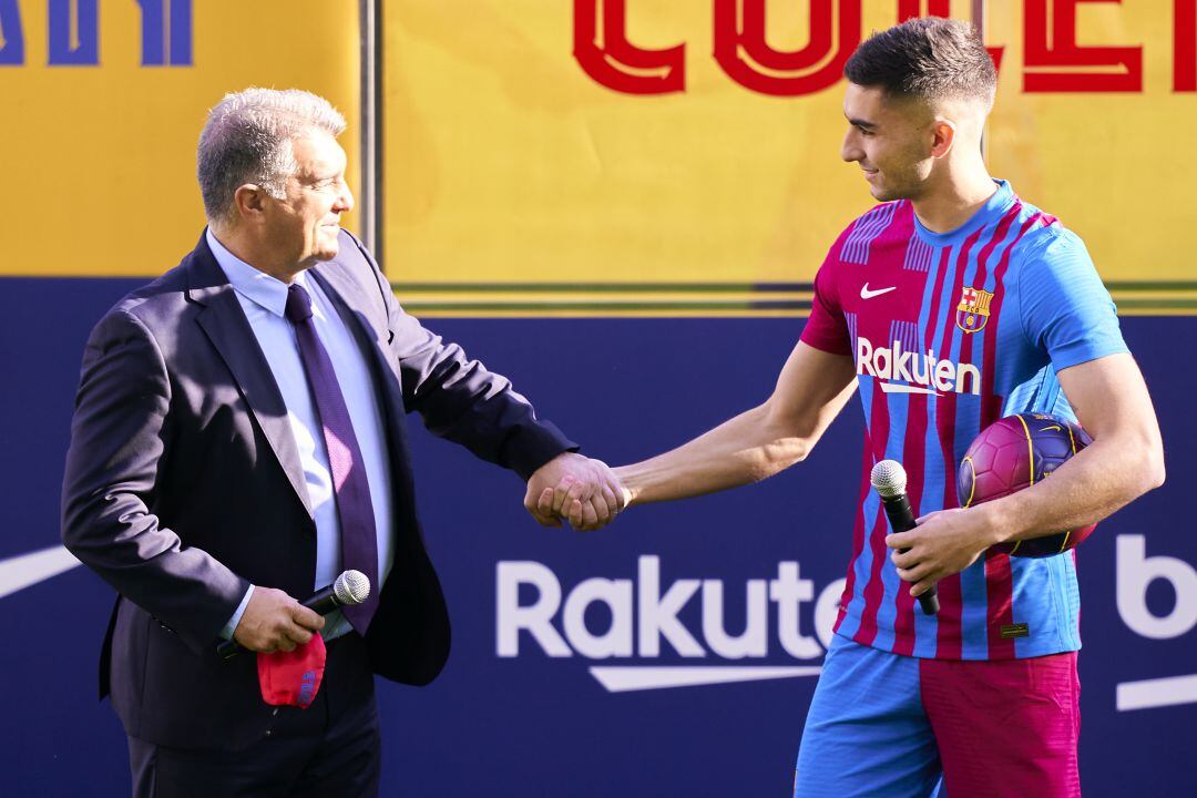 Joan Laporta y Ferran Torres