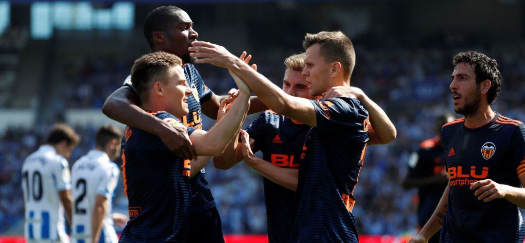 Gameiro festeja junto a sus compañeros el tanto de la victoria