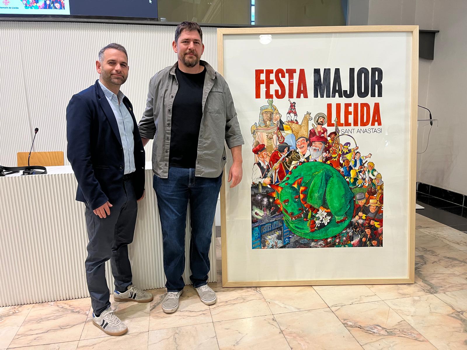 Xavier Blanco i el creador del cartell de la Festa Major 2025, Oriol Caminal. El cartell representa un rellotge amb els principals elements festius al seu voltant.