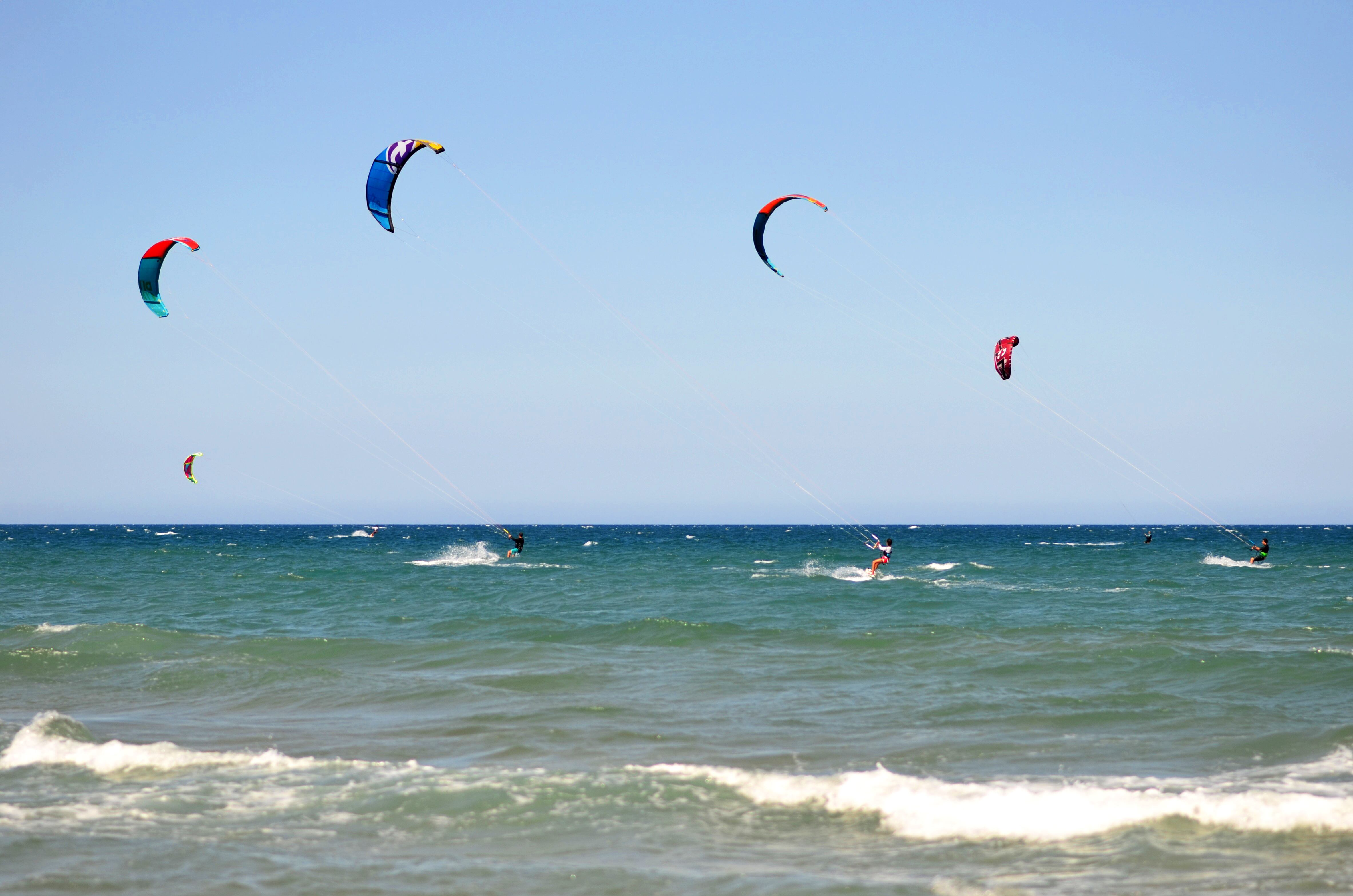 Beach with kite surfing activities