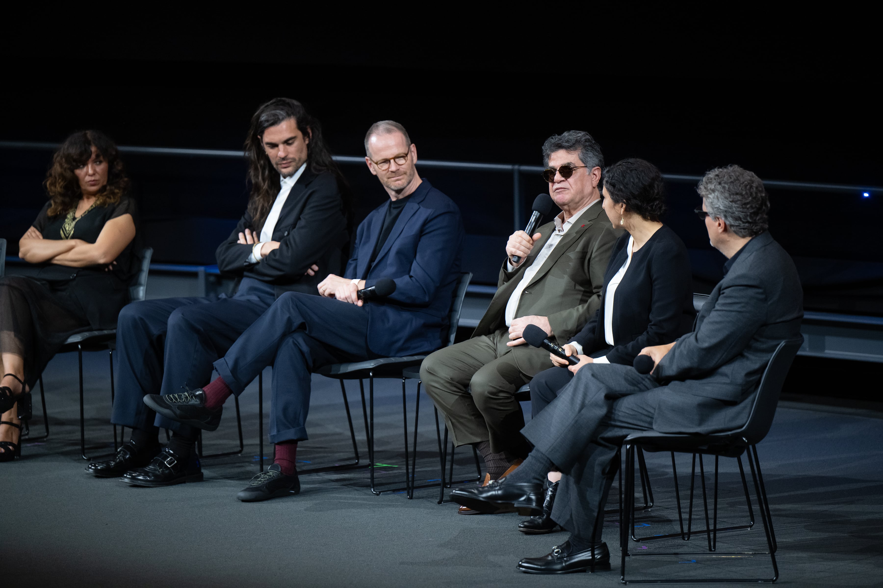 LOS ANGELES, CA - MARCH 13: Oscar® Nominees Kaouther Ben Hania of "The Voice of Hind Rajab," Oliver Laxe of "Sirât," Joachim Trier of "Sentimental Value," Jafar Panahi of "It Was Just an Accident," interpreter Sheida Dayani of "It Was Just an Accident" and Kleber Mendonça Filho of "The Secret Agent" participate in 2026 Oscar Nominee Spotlights: International Feature Film on March 13, 2026 in Los Angeles, California. (Photo by Nick Agro/Academy Museum Foundation via Getty Images)