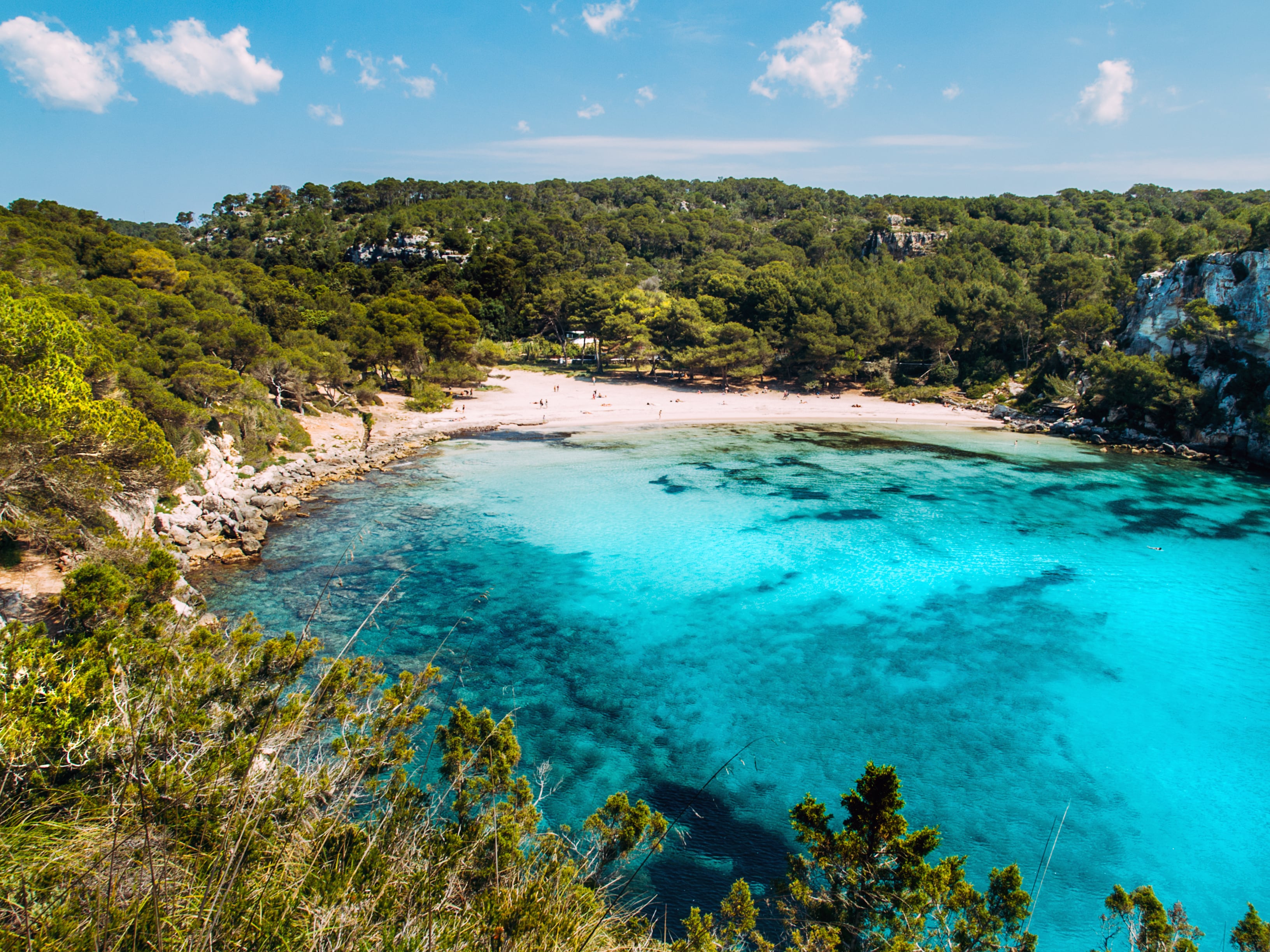 View from above of the Macarella beach (Menorca, Spain), famous small bay in Balearic Islands.