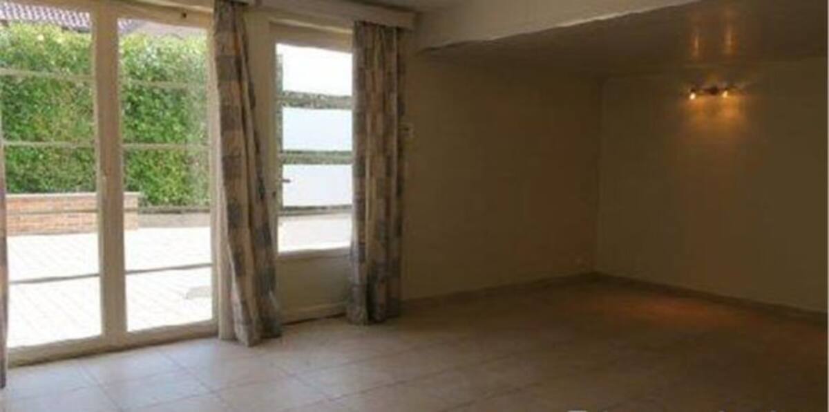 Uno de los dormitorios de la casa belga.