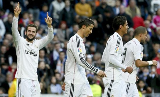 El defensa del Real Madrid Nacho Fernández celebra la consecución del tercer gol de su equipo ante el Espanyol